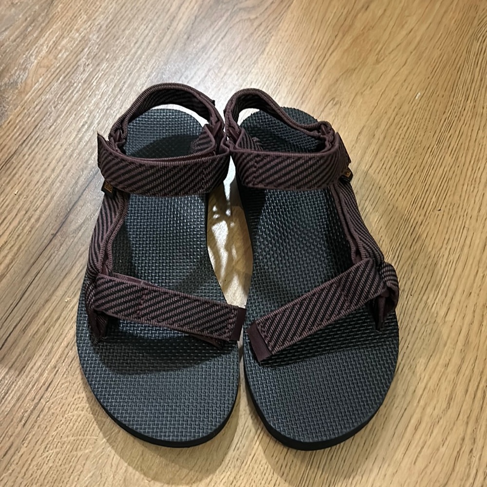 - Women’s Teva sandals, never worn